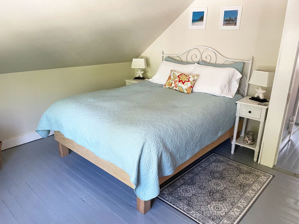 Queen bedroom (there are shades on windows)