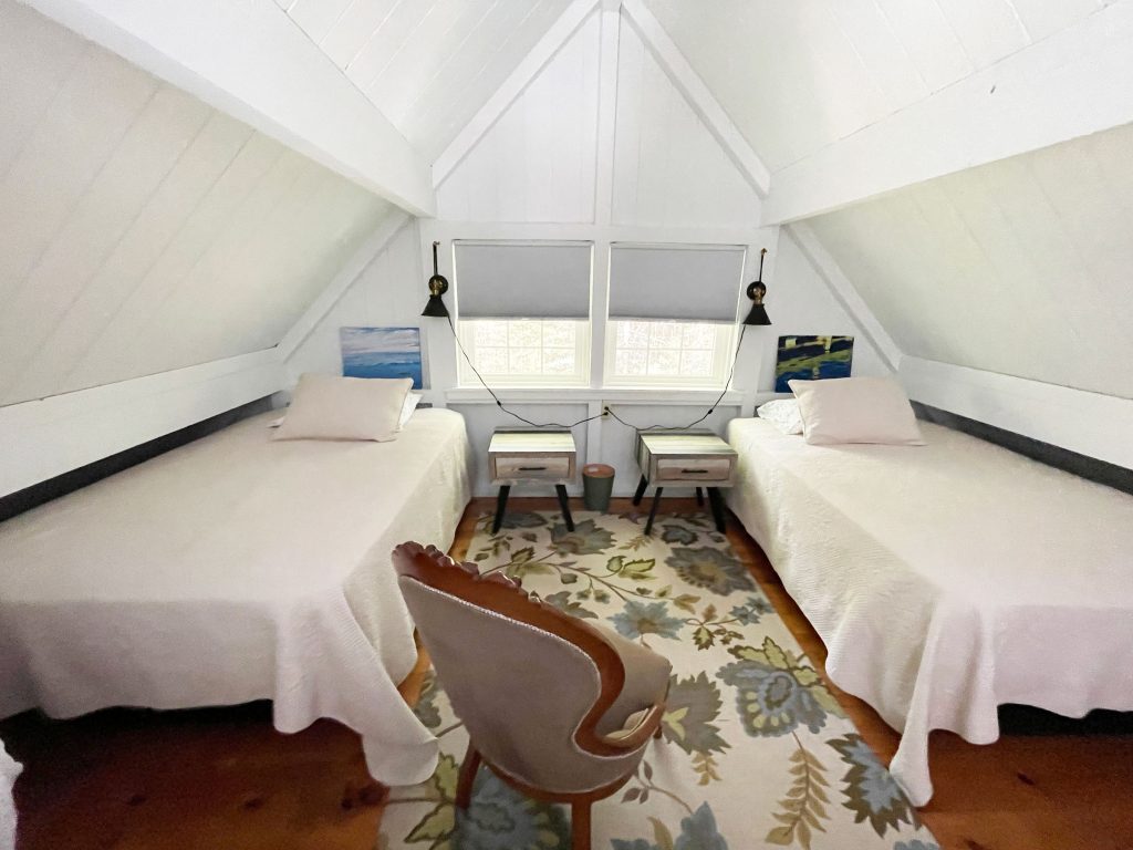 Loft bedroom with two double beds