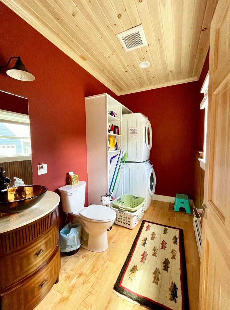 Main level half bath with laundry