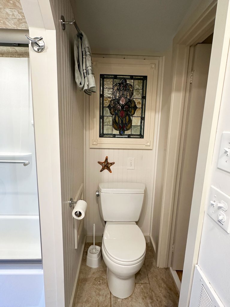 Full bathroom with laundry