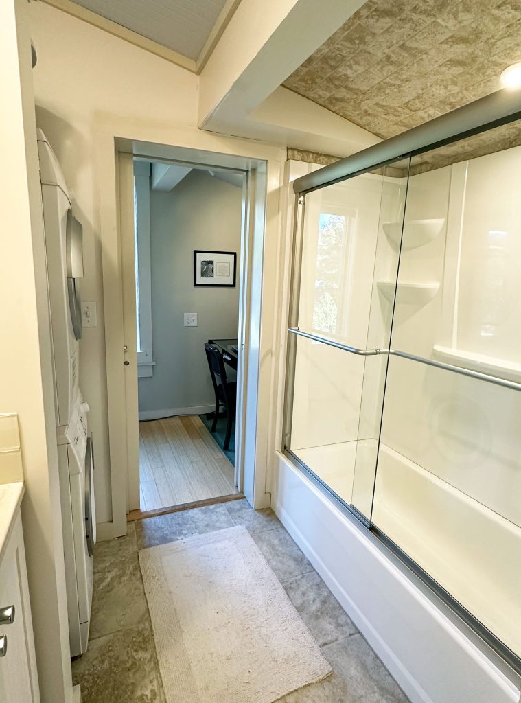 Full bathroom with laundry
